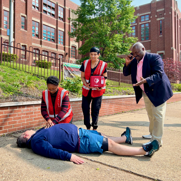 community lifesavers performing CPR